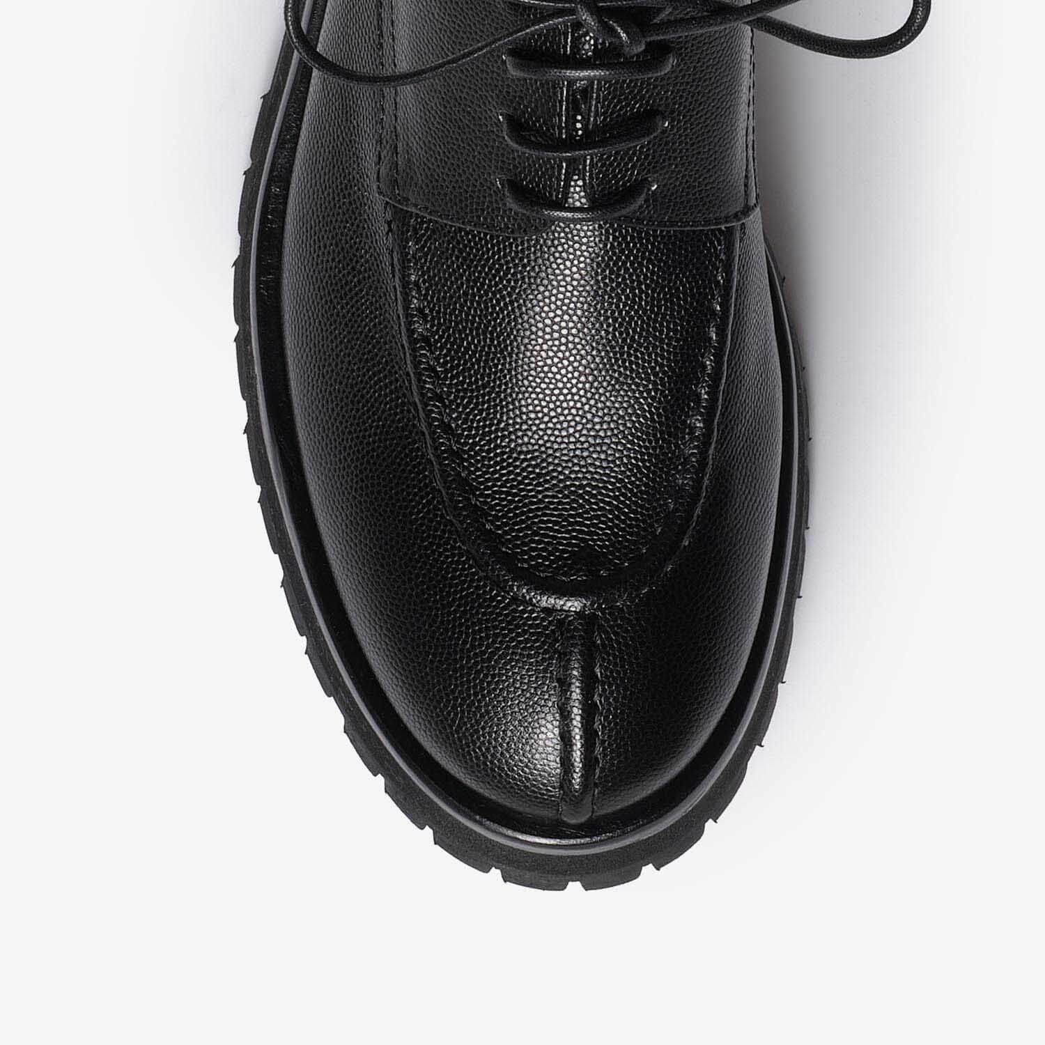 Black women's leather derby