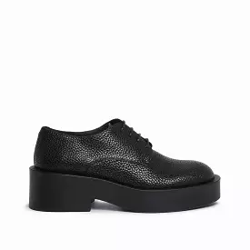 Black women's textured leather derby