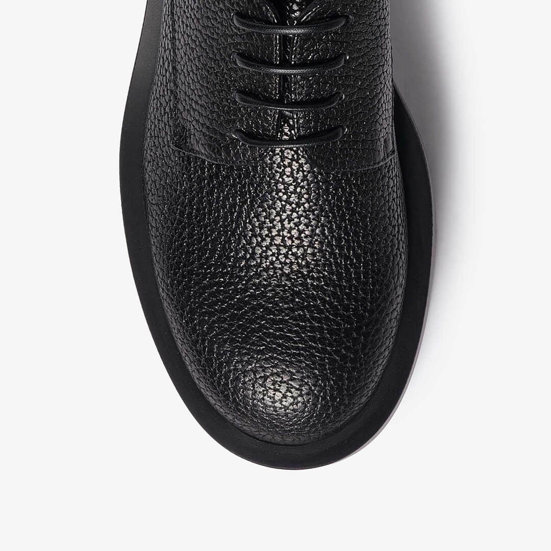 Black women's textured leather derby